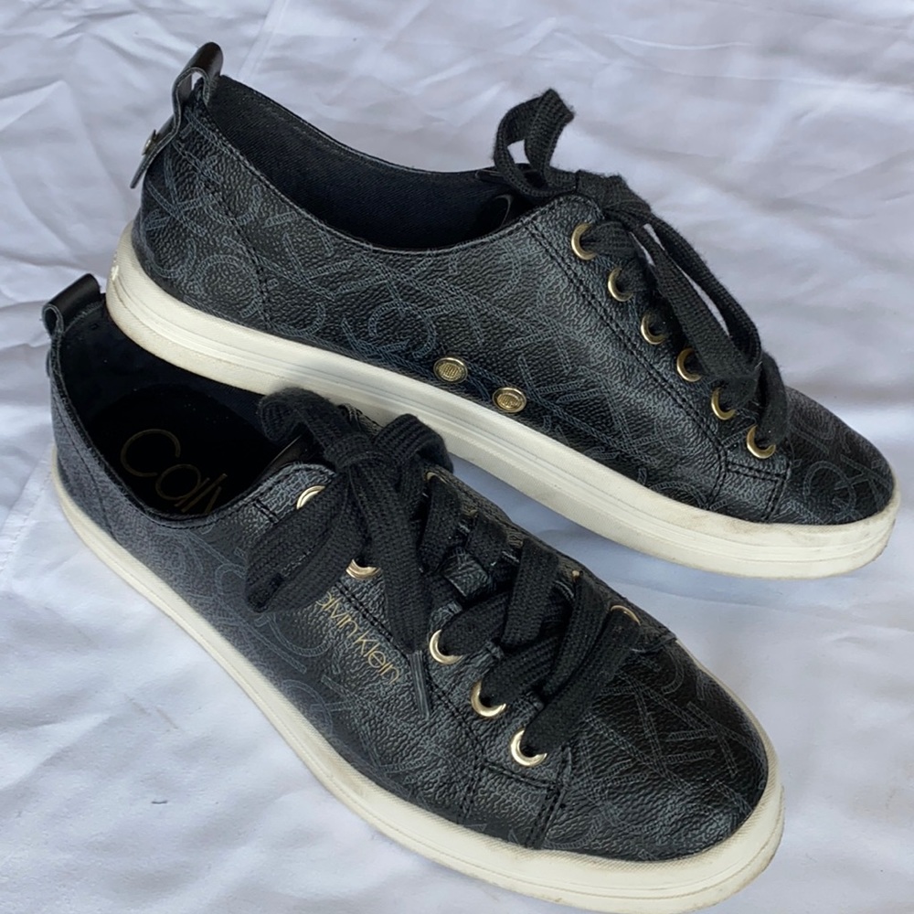 Calvin Klein black and gold sneakers